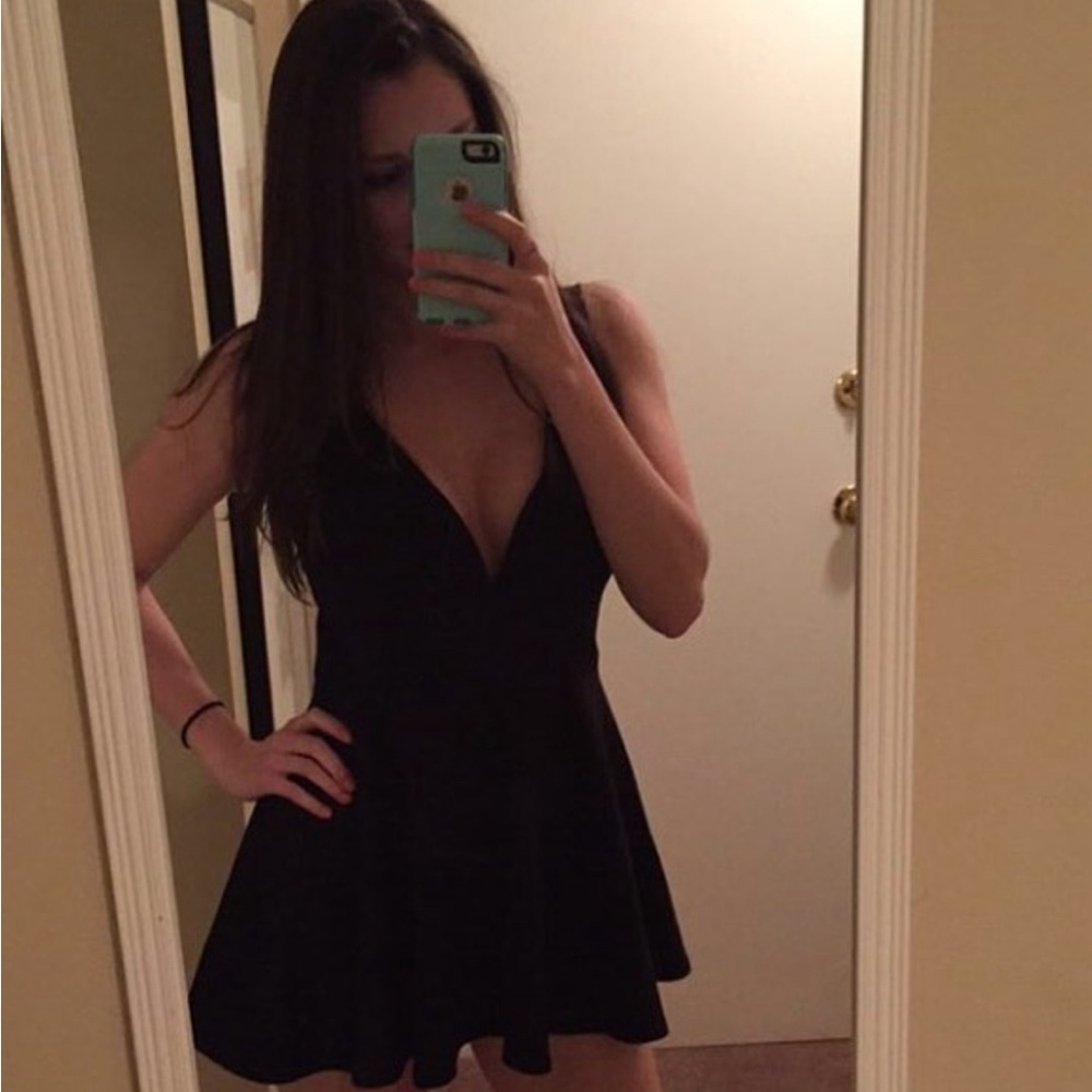 Mini black v-neck dress with built in shorts
